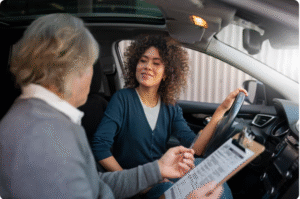Driving instructor and student during a lesson