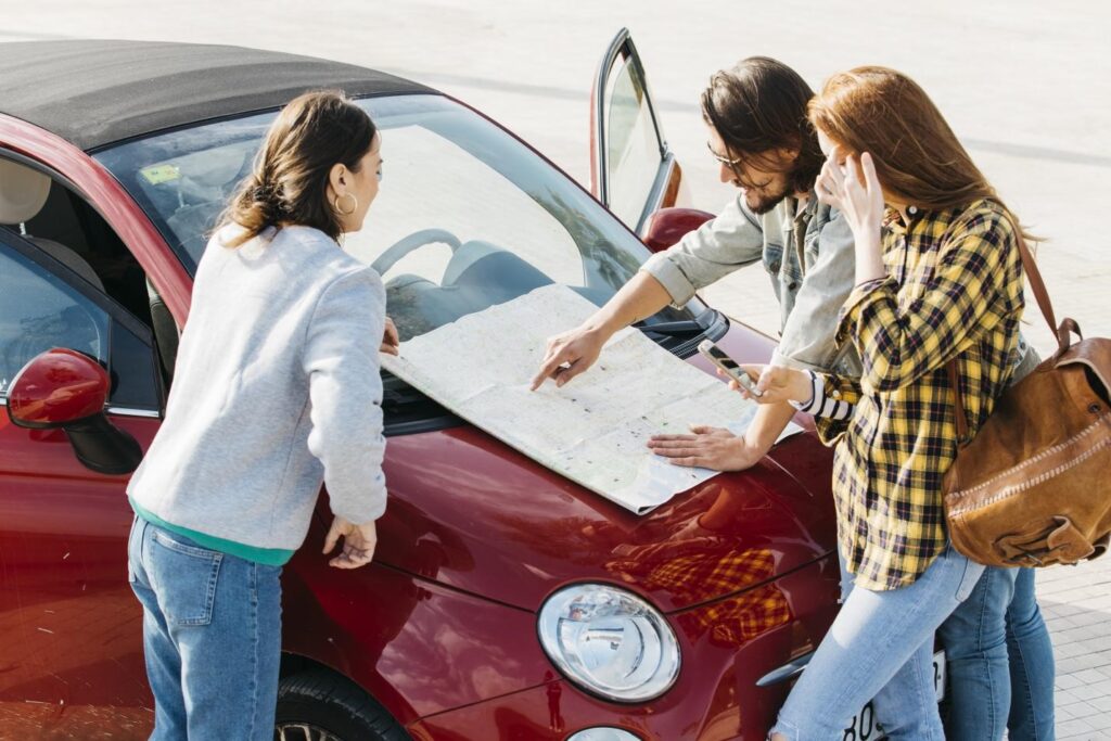 Driving instructor explaining route map for SAAQ road test preparation in Montreal